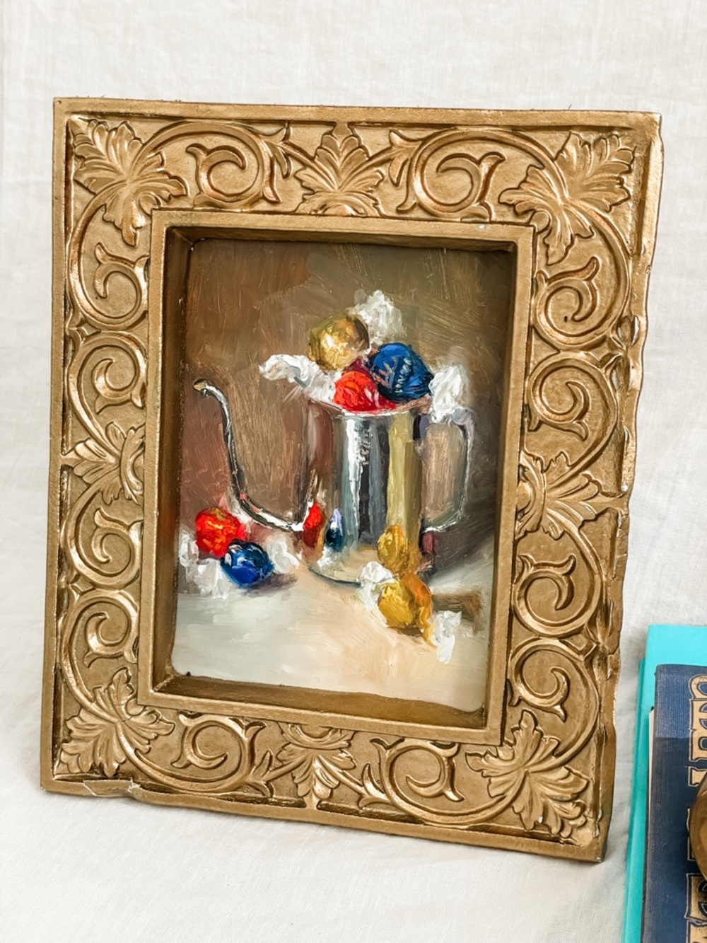 Beautiful Impressionism oil painting of silver tea cup with chocolates